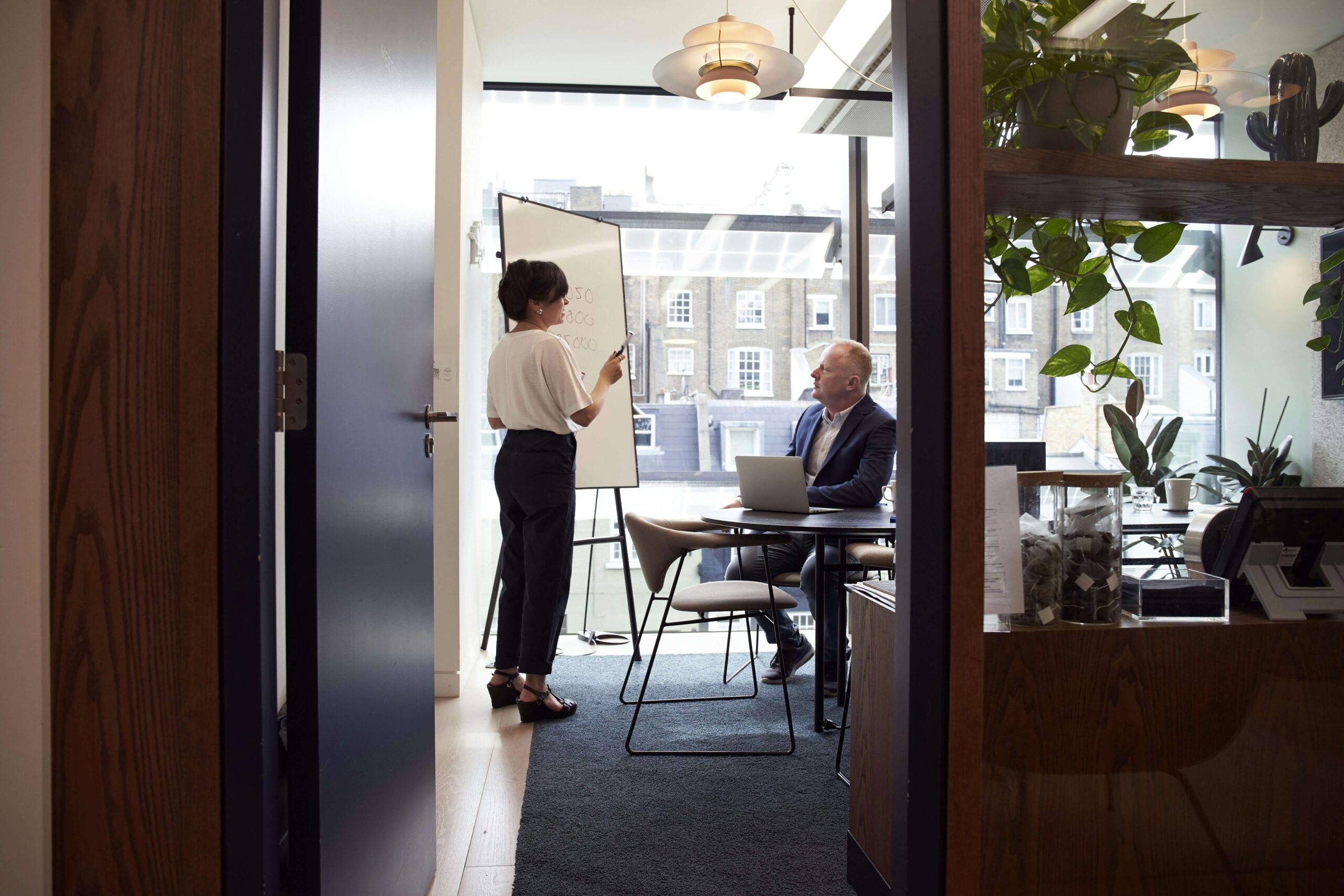 Business Managers Bounce Ideas Off One Another.