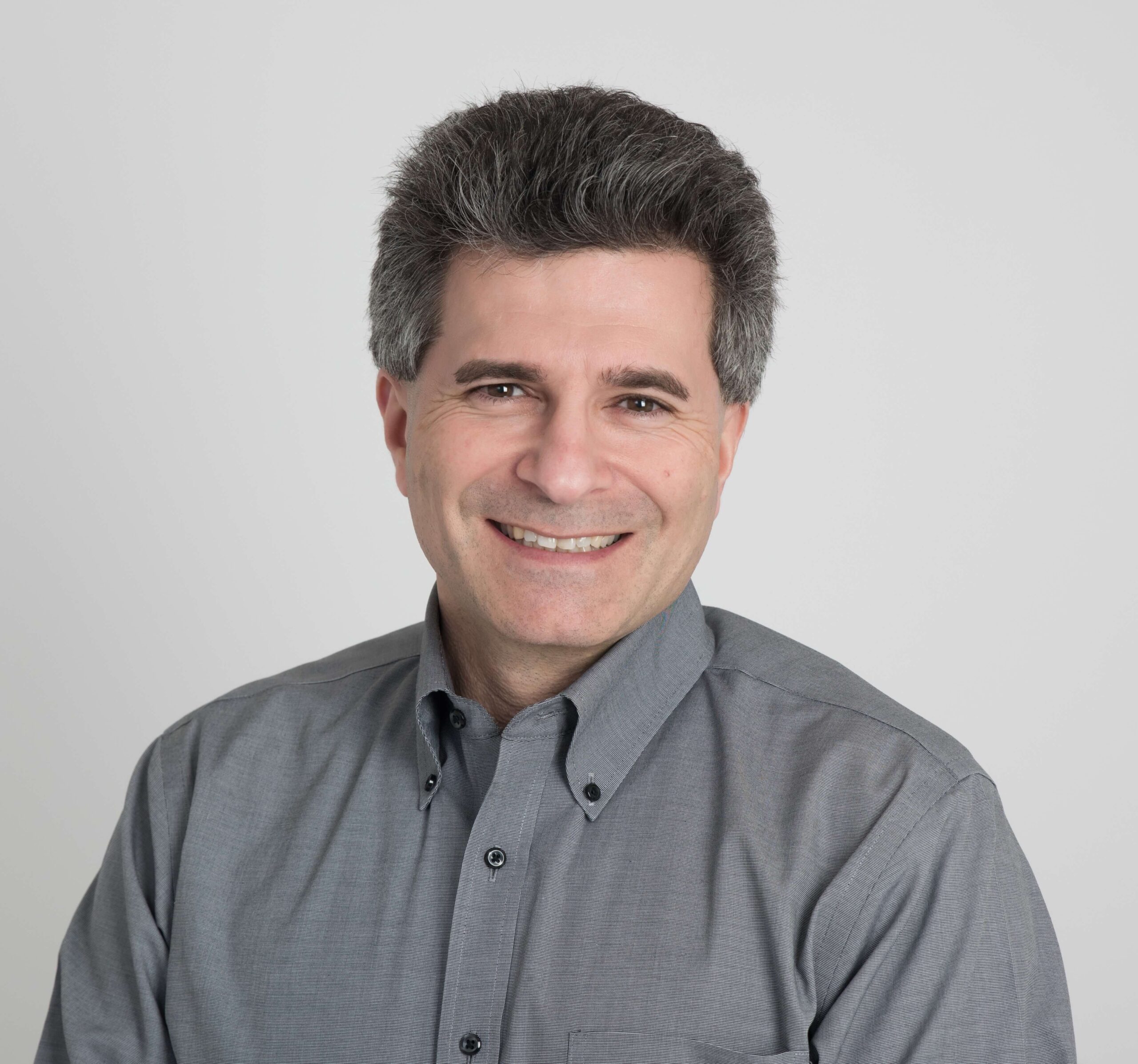 Professional headshot of Eric Mitchellette, Certified Exit Planning Advisor and Strategic Business Coach.
